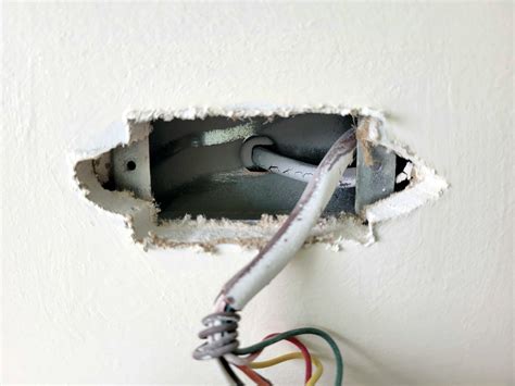 patching electrical box hole in drywall|drywall around electrical box.